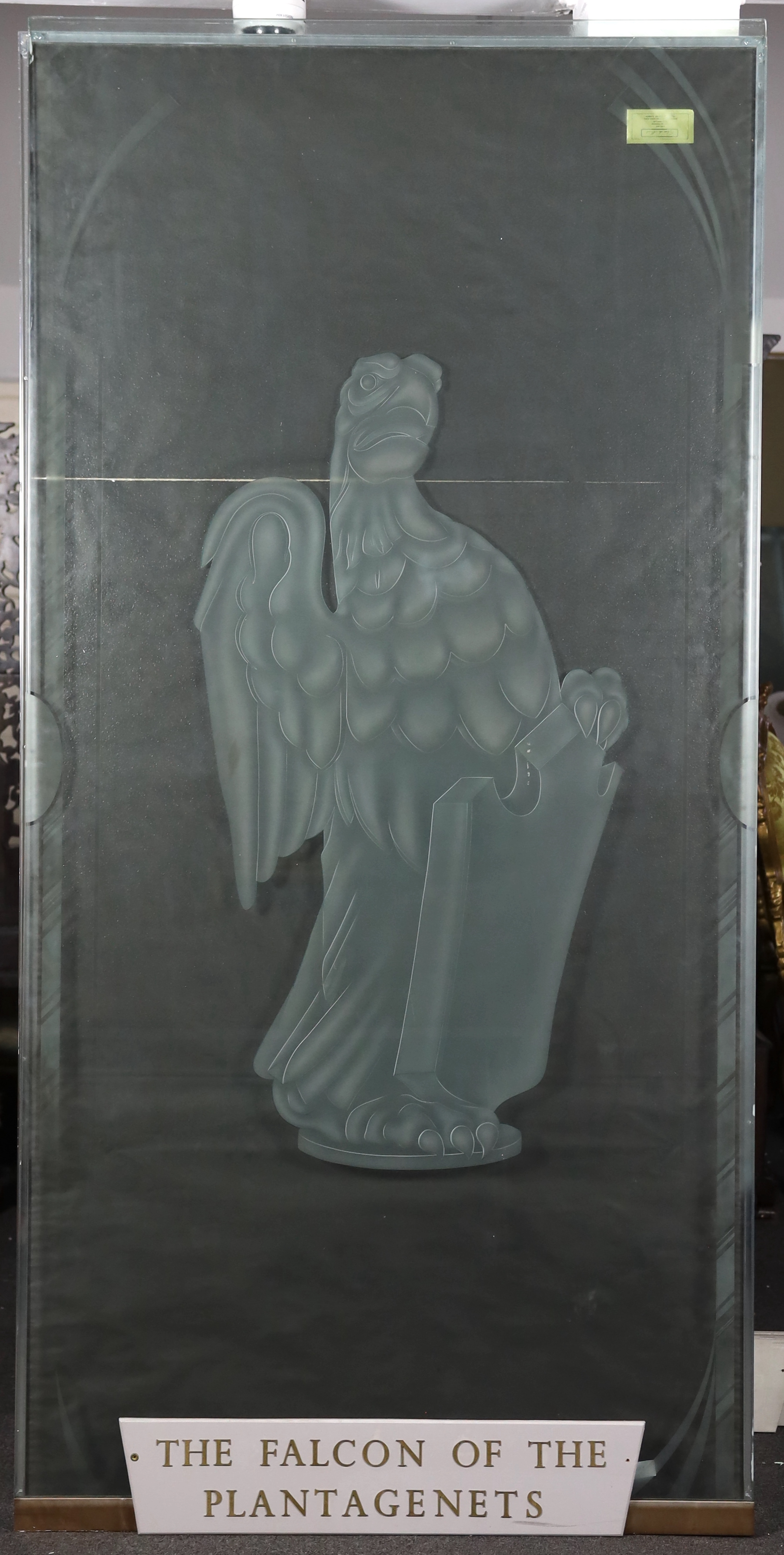 A set of six large cut and etched glass door panels